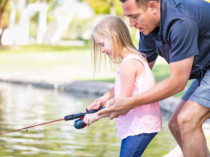 father and daughter fishing